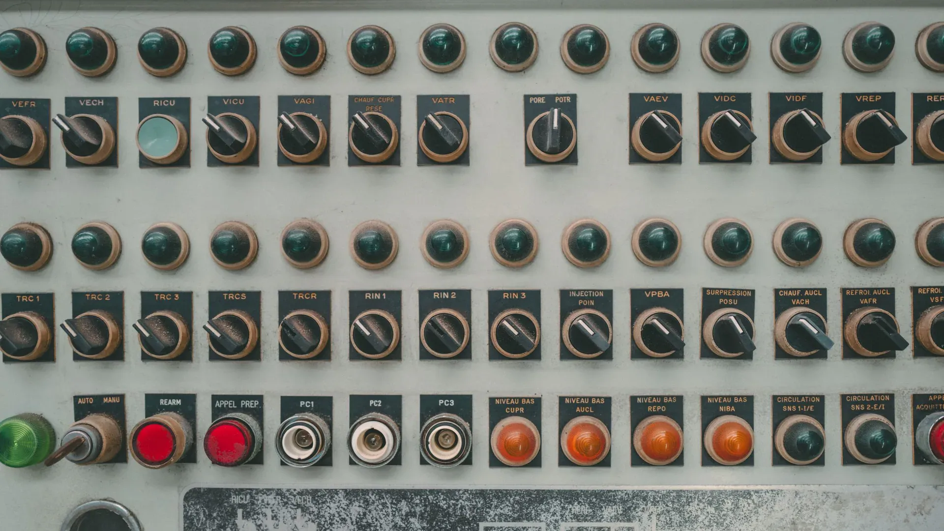 Legacy push-button control panel on an industrial machine