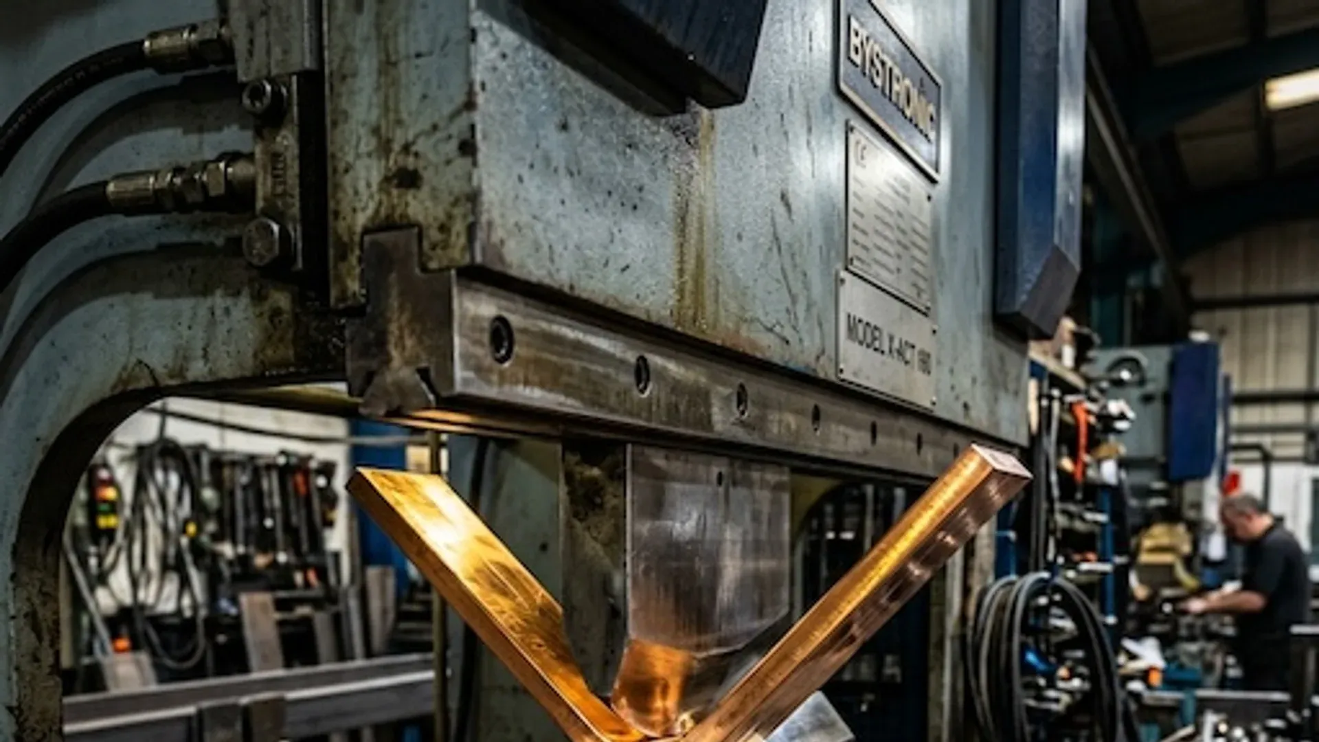 Copper bar being heated and formed on an industrial bending machine