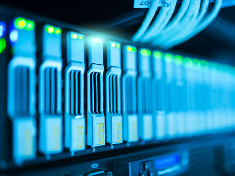 Detailed image of a server rack with glowing lights in a modern data center