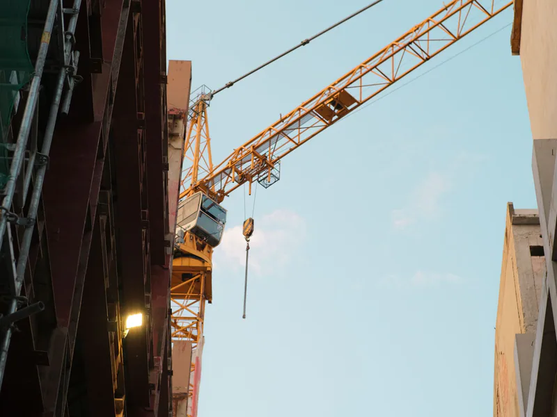 A construction crane dominates the urban skyline of Bratislava, Slovakia