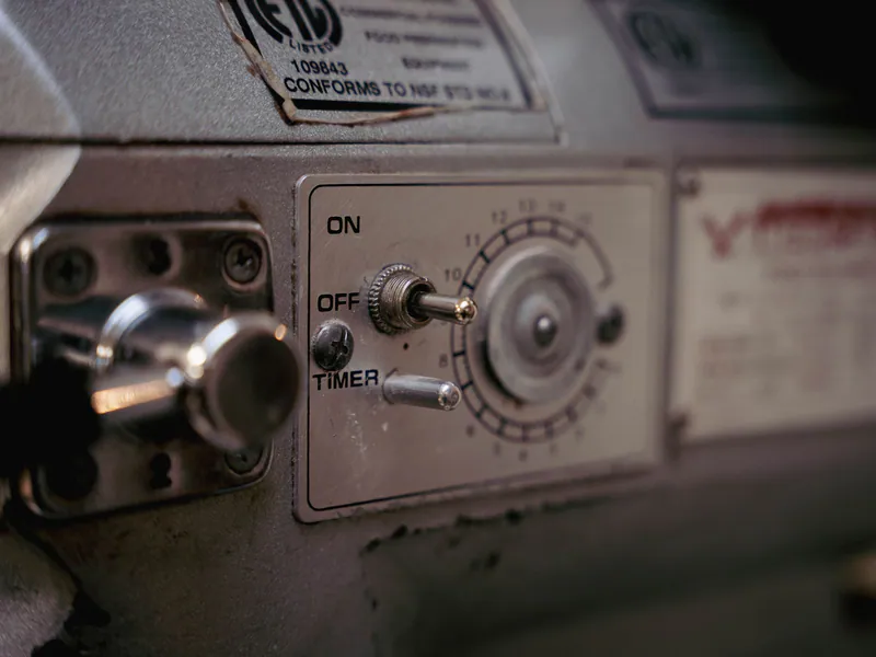Legacy industrial machine controls with manual timer and rotary switch