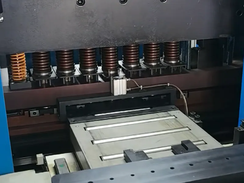 CNC busbar punching station with tooling and work table