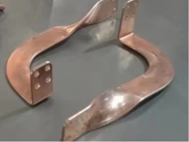 Rigid copper busbar samples with multi-plane bends